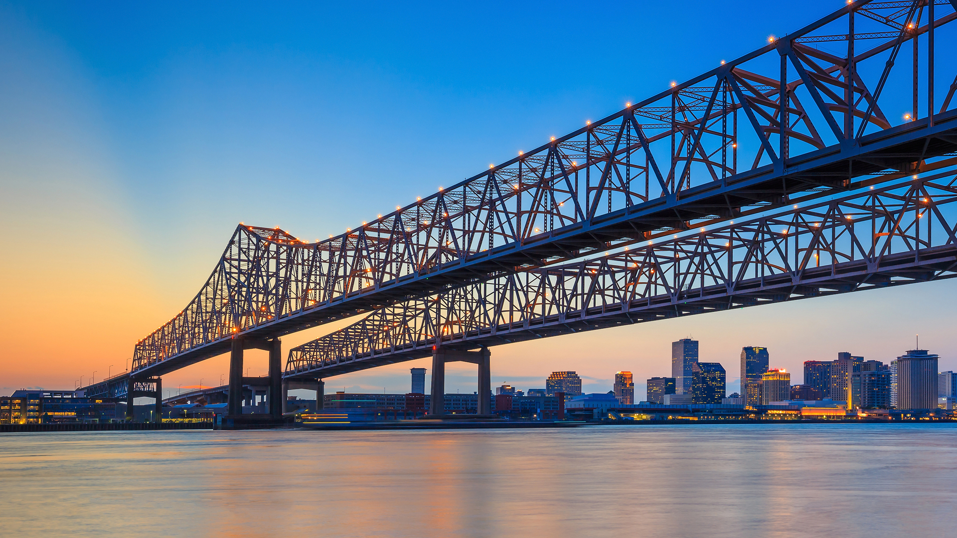 Twin cantilever bridges over the Mississippi at New Orleans at dusk
